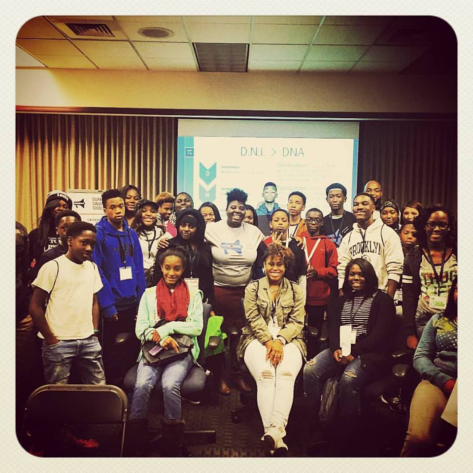 Carlton, hidden in the back right, with  students at the YCC Youth Conference where he was a facilitator.